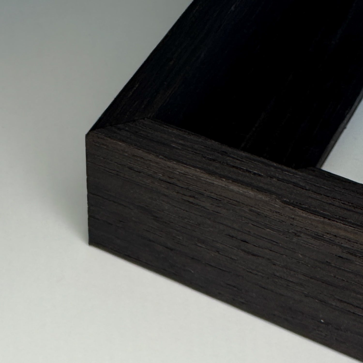 Floater frame in smoked oak
