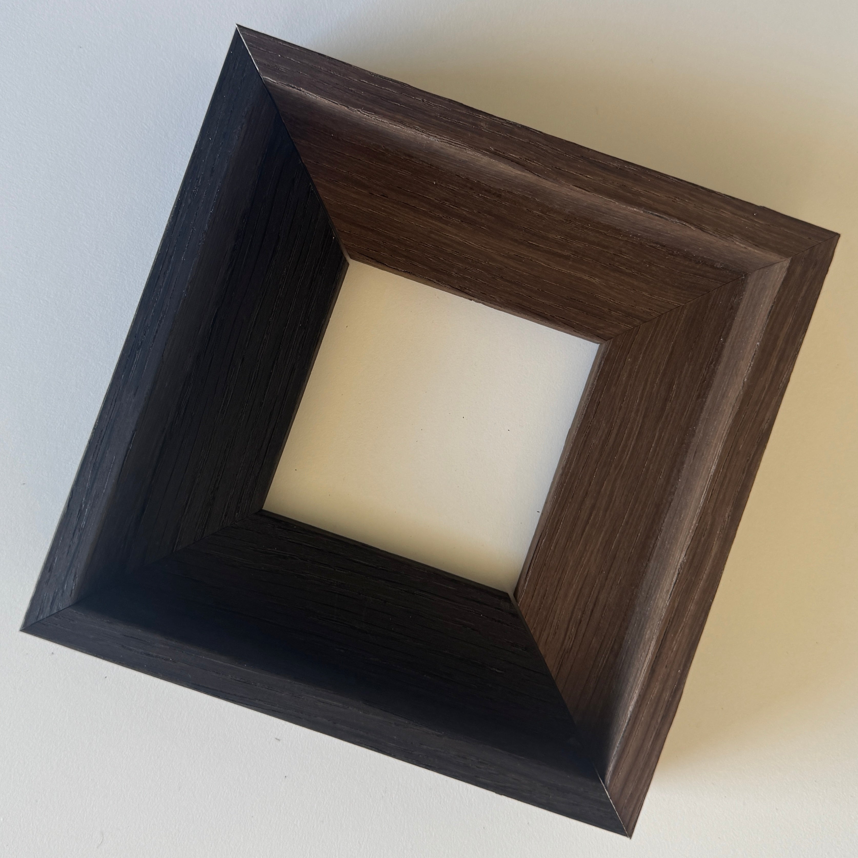 Floater frame in brown oak
