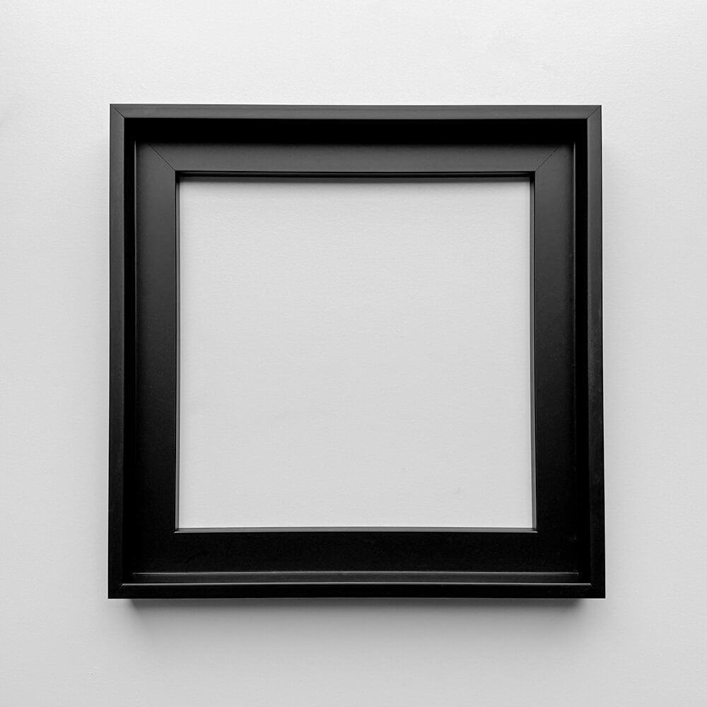 Hovering frame in black wood